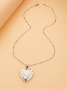 Color: Silver Gender: Women Material: Stainless Steel Quantity: 1 piece Style: Fashionable Details: Heart Type: Pendant Necklaces IN Length 19.7 This data was obtained from manually measuring the product, it may be off by 1-2 CM. Heart Charm Necklace With Round Pendant, Heart Charm Metal Necklace, Metal Heart Pendant Necklace, Metal Heart Pendant Necklace For Valentine's Day, Valentine's Day Metal Heart Necklace, Heart-shaped Jewelry With Heart Graphic For Valentine's Day, Heart Shaped Metal Necklace For Gifts, Heart-shaped Metal Necklace For Gift, Metal Heart Necklace Gift