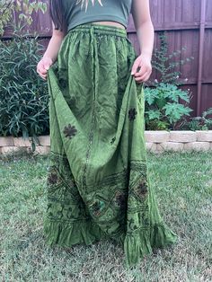 Introducing our Pari Vintage Vibe Green Embroidery Maxi Skirt, perfect for embracing those boho and hippie vibes! This stunning skirt features pleated borders that add a touch of elegance, while the maxi length offers a chic and comfortable fit.Crafted with fairly-core fashion inspiration, this skirt is ideal for creating enchanting cottage-core looks. Whether you're strolling along sandy shores or exploring hidden getaways, this skirt will ensure you're dressed to impress. Its flowing silhouett Green Bohemian Maxi Skirt With Boho Print, Green Bohemian Maxi Skirt For Festival, Bohemian Green Maxi Skirt For Festivals, Green Hippie Maxi Skirt For Festival, Bohemian Cotton Maxi Skirt, Bohemian Cotton Skirt, Bohemian Flowy Floor-length Maxi Skirt, Green Flowy Bohemian Maxi Skirt, Flowy Lined Maxi Skirt For Festivals