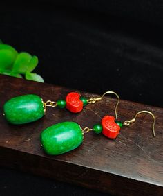 Regular Green Sterling Silver Jade Cinnabar Drop EarringsMade of fine Sterling Silver Jade Cinnabar.Measurement: 5.7cm/2.223" * 1.3cm/0.507". Matches easily with daily hairstyle, dresses & Shirts Unique Jade Dangle Jewelry, Traditional Pierced Jade Earrings, Handmade Traditional Jade Earrings, Traditional Handmade Jade Earrings, Traditional Jade Drop Earrings, Hypoallergenic Dangle Jade Earrings, Traditional Green Jade Earrings, Silver Jade Dangle Earrings, Bohemian Jade Gemstone Earrings