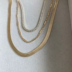 Simple and elegant in design, this gold filled necklace is a perfect addition for someone looking for a dainty gold necklace to add to their daily rotation. Pair with a pendant, beaded necklace, or STACK with the essential stack. Gold Plated Beaded Chain Necklace, Dainty Beaded Chain Layered Necklace, Minimalist Beaded Chain Gold Plated Necklace, Dainty Jewelry With Beaded Chain For Layering, Elegant Beaded Necklaces With Adjustable Chain For Layering, Dainty Beaded Chain Jewelry For Layering, Minimalist Gold-plated Beaded Chain Necklace, Elegant Gold Crystal Necklaces For Layering, Elegant 14k Gold Filled Necklaces