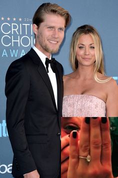 a man and woman standing next to each other in front of a blue carpeted wall