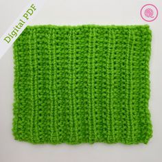 a green knitted dishcloth on a white background with the words digital pad below it