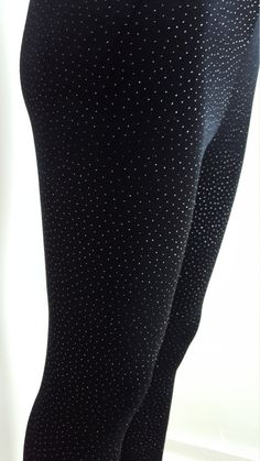 "Shimmer and shine in these velvet leggings so divine! This all over tiny tiny polka dot is subtly enhanced with silver glitter that sparkles with the slightest movement. Same great fit as our solid leggings, these are sure to stand out in a crowd. Silver glitter pin dots on a black, stretch vevet background. Form fitting, with an elastic waistband. Machine washable in cold water, do not bleach, hang to dry and do not iron. 90% Polyester 10% Spandex Please specify the size from the chart picture Velvet Leggings Outfit, Glitter Pin, Shimmer And Shine, Solid Leggings, Velvet Leggings, Shimmer N Shine, Womens Leggings, Stretch Velvet, Black Stretch