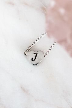 Discover our exquisite collection featuring custom stainless steel mini heart necklace with personalized initial, perfect for creating a unique and meaningful custom gift.  Minimalist delicate customized gift for mom, best friend, or special someone.   How to Order: ❣️ 1.  Choose Silver or Gold 2.  Choose Custom Engraving or NO Engraving 3.  Add to Cart 4.  Add Initial Desired and Font Choice to Personalization Box or N/A if not applicable 5.  Check out Material: 🌿 Waterproof, non-tarnish, hypo Personalized Stainless Steel Heart Pendant Jewelry, Personalized Stainless Steel Heart Pendant, Stainless Steel Initials Name Necklace, Dainty Silver Heart Pendant Initial Necklace, Minimalist Stainless Steel Jewelry For Personalized Gifts, Dainty Silver Initial Necklace For Valentine's Day, Personalized Heart Pendant Charm Necklace For Everyday, Customizable Sterling Silver Charm Necklace For Best Friend, Silver Minimalist Personalized Initial Necklace