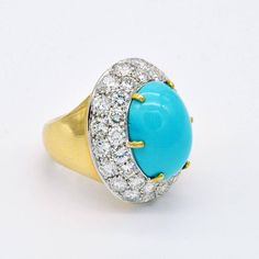 Women's Large Turquoise Diamond Gold Cocktail Ring For Sale Luxury Turquoise Gemstone Ring, Fine Jewelry Turquoise Diamond Ring, Elegant Turquoise Multi-stone Rings, Elegant Polished Turquoise Ring, Elegant Multi-stone Turquoise Ring, Elegant Multi-stone Turquoise Gemstones, Turquoise Diamond Ring With Center Stone, Luxury Turquoise Diamond Ring As Gift, Elegant Turquoise Diamond Ring