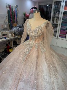 Princess Style Glitter Tulle Ball Gown For Wedding, Glamorous Champagne Tulle Gown, Champagne Tulle Ball Gown, Princess Style Organza Evening Dress For Wedding, Tulle Wedding Dress With Sheer Bodice For Banquets, Elegant Organza Wedding Dress For Quinceanera, Champagne Embellished Tulle Gown, Sparkling Ball Gown For Wedding And Prom Season, Elegant Organza Quinceanera Ball Gown Dress