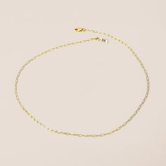 A modern twist on a classic chain Necklace. This beautiful, minimalist necklace is crafted from high-quality 14k gold fill, 14k rose gold fill, or sterling silver and features a delicate paperclip chain. The perfect accessory for any outfit, this versatile necklace can be worn as a choker or a longer style necklace and is great for stringing your favorite charms. A great choice for everyday wear, this timeless piece will make a wonderful addition to your jewelry collection. Paperclip Chain Necklace, 20 Inch Necklace, Princess Necklace, Wear Necklaces, Round Necklace, Month Gifts, Necklace Chain Lengths, Short Necklace, Minimalist Necklace