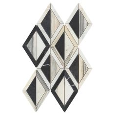 black and white marble mosaic tile with diamond shapes on the bottom, in an angled pattern