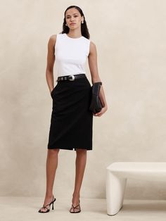 Indulgent and elegant, this expertly tailored pencil skirt elevates any wardrobe with a luxurious wool fabrication and a darted waist to accentuate in stunning proportions.  PENCIL SKIRT FIT: High rise, fitted from hip to hem.  RESPONSIBLE WOOL STANDARD CERTIFIED (Control Union Certifications CU 862581): This global standard protects the sheep that supply the wool for this sweater as well as the land they graze, working to make it better for the environment and the sheep.  Certified by NSF Certi Banker Outfits, Office Fits, Work Skirt, Business Attire Women, Tailored Skirt, Color Blocking Outfits, Pencil Skirt Outfits, Wool Pencil Skirt, Work Skirts