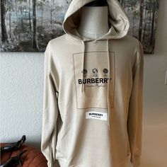 Burberry Hoodie Eu Size Xxl Authentic Logo Detail Long Sleeve Hoodie For Fall, Long Sleeve Hoodie With Logo For Fall, Long Sleeve Hoodie With Logo Detail For Fall, Winter Trendy Sweatshirt With Logo Detail, Fall Hoodie With Logo Detail, Designer Cotton Sweatshirt For Fall, Designer Long Sleeve Winter Sweatshirt, Hooded Top With Logo Detail For Fall, Designer Cotton Sweatshirt For Winter