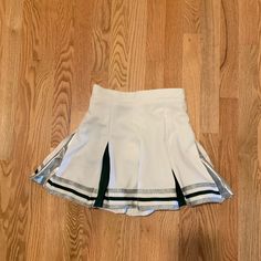 Never Worn Nwt Cheer Skirt Waist 25” White Skirt Emerald Green/Silver Color Block Pleats + Stripes Cheerleader Skirt, Cheerleading Uniforms, Gold Skirt, Halloween Costume Outfits, Dance Skirt, White Skirt, Costume Outfits, White Skirts, Cheerleading