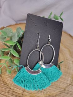 Handcrafted exclusively for your person favorite person in mind. These earrings are made with a silver metal oval with Turquoise fringe. All of earring hooks and jump rings are made of metal alloy, high quality nickel free & lead free, earring backs are made of clear silicone. They are safe and no reactions to very sensitive skin Silver Tassel Earrings Nickel Free For Gift, Silver Tassel Earrings With Fringe As Gift, Silver Dangle Tassel Earrings, Trendy Silver Fringe Jewelry, Silver Fringe Drop Earrings, Turquoise Fringe Earrings For Summer, Metal Tassel Dangle Earrings With Fringe, Silver Dangle Tassel Earrings With Fringe, Bohemian Silver Fringe Earrings