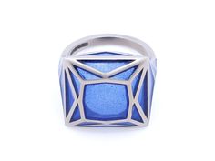 Blue plique-à-jour enamel ring in 18K white gold. Signed SA-P for Solange Azagury-Partridge, with English hallmarks. The retail price is £5800 (approximately $7500). Plique-à-jour is a difficult enameling process in which enamel is applied to an area with no backing instead of onto metal. The result is the enamel is transparent or translucent. Modern White Gold Rings With Enamel, Modern Enamel Rings For Formal Occasions, Luxury Enamel Ring With Polished Finish, Blue Enamel Fine Jewelry Ring, Blue Enamel Ring Fine Jewelry, Blue Enamel Ring In Fine Jewelry Style, White Gold Enamel Rings With Polished Finish, Blue Polished Enamel Ring, Blue Enamel Polished Round Ring