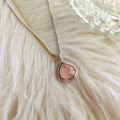 An essential in every gemstone jewelry collection, our Rose Quartz Compassionate Heart Adjustable necklace features the "Stone of Love", perfect for every day wear.  Rose quartz is considered beneficial for not only romantic love, but for helping to enhance unconditional love in friendships, and heal trauma and emotional wounds. Rose quartz is thought to increase compassion for self and others.  This necklace features a rose cut pear shaped rose quartz stone. White rhodium over sterling silver w Silver Heart Shaped Feminine Necklace, Silver Heart Necklace Feminine Style, Feminine Silver Heart Necklace, Rose Gold Sterling Silver Pendant Crystal Necklace, Elegant Crystal Clavicle Chain Necklace For Valentine's Day, Elegant Clavicle Crystal Necklace For Valentine's Day, Elegant Silver Charm Necklace With Gemstone, Elegant Silver Gemstone Charm Necklace, Rose Gold Sterling Silver Birthstone Necklace