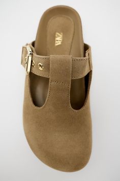 BUCKLED SUEDE CLOGS - Brown | ZARA United States Suede Slip-on Mules With Buckle Closure, Suede Clogs With Buckle Closure And Round Toe, Suede Slip-on Clogs With Buckle Closure, Closed Toe Suede Clogs With Buckle Closure, Suede Closed Toe Clogs With Buckle Closure, Suede Mules With Flat Heel, Suede Clogs For Workwear, Suede Closed Toe Sandals For Work, Leather Mules With Buckle Closure And Low Heel