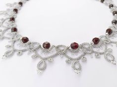 Exquisite crystal choker necklace in Edwardian style. Great as wedding jewelry. The handmade silver lace necklace is made in ancient tatting (frivolite) technique, with woven crystals and Preciosa Czech seed beads. Simple elegance and beauty! ORDERS ABOVE 110$ ARE SHIPPED WITH FedEx or EMS for FREE! When you choose from the drop-down list, Color represents the color of the thread which you combine with crystals from the other dropdown. Seed beads will complement your choice.  Necklace total leng Crystal Necklace With Intricate Design For Parties, Silver Crystal Necklace With Intricate Design, Silver Necklace With Intricate Crystal Design, Silver Filigree Bridal Necklace Gift, Crystal Necklaces With Silver Beads For Gift, Crystal Necklaces With Silver Beads As Gift, Silver Filigree Bridal Necklace As A Gift, Silver Beads Choker Jewelry Gift, Beaded Silver Choker Bridal Necklace