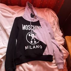 Moschino Hoodie In Us Size 8. Good Condition And Has Only Been Worn A Couple Of Times. Unsure Of Original Price* Winter Trendy Sweatshirt With Logo Detail, Moschino Hoodie, Colorful Hoodies, Moschino, Black Gray, A Couple, Black And Grey, Womens Tops, Sweatshirts Hoodie