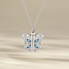 This photo necklace is the best choice to make the memory eternal. It features butterfly designed to open and close. The necklace is created in sterling silver with stunning details, with your own photo included, this beautiful piece will be more memorable. Never miss this romantic and exquisite piece!Carat Weight: 1 ctStone Size: 2*4 mmStone Type: Jeulia® StoneNumber of Stones: 8 Stone Color: Aquamarine BlueStone Shape: MarquiseWeight: 6.1 gWidth: 21.3 mmHeight: 21.4 mmThickness: 5.2 mmMaterial Butterfly Charm Pendant Jewelry For Anniversary, Elegant Butterfly Birthstone Necklaces, Elegant Butterfly Birthstone Jewelry, Elegant Butterfly Necklace For Anniversary And Mother's Day, Butterfly Shaped Birthstone Jewelry For Anniversary, Butterfly Shape Birthstone Jewelry For Anniversary, White Gold Jewelry With Butterfly Charm For Anniversary, Anniversary White Gold Jewelry With Butterfly Charm, Sterling Silver Locket Necklace For Mom