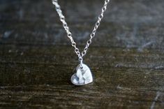 A small silver heart, hammered lightly, on a delicate sterling silver chain.  Heart is 9 x 8 mm {5/16 of an inch at it's widest.} Sterling silver. Necklace as shown in the 3rd picture is 17 inches total length. Please choose your length preference from the drop-down options or leave me a message in the 'note to seller' box at checkout. Please let me know if you have any questions!«««««««««««««««««««««««««««««««««««««««««««««««««««««««««««««««««««««««««If you need more that what I have shown as a Best Friends Graduation, Friends Graduation, Heart Necklace Silver, Friend Graduation, Chain Heart, Silver Heart Pendant, Silver Heart Necklace, Sterling Silver Chain, Necklace Silver