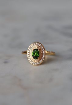 Genuine Green Tourmaline Ring: 18K Gold Plated, Silver Gemstone Ring 💍✨ Elevate your style with our Genuine Green Tourmaline Ring.  This exquisite piece features a stunning green tourmaline gemstone set in a delicate design with 18K gold plating over sterling silver.  Perfect as a birthstone ring, statement ring, or a special gift for her, this ring adds a touch of elegance to any outfit. 💚🌟 Key Features: Genuine Green Tourmaline: Showcases a vibrant, natural green tourmaline gemstone, known Tourmaline May Birthstone Promise Rings, Tourmaline Promise Ring For May Birthstone, Gold Tourmaline Ring With Accent Stones, Green Tourmaline Rings With Halo Setting, Green Tourmaline Ring With Halo Setting, Gold Tourmaline Ring For May Birthstone, Fine Jewelry Tourmaline Ring For May Birthstone, Tourmaline Ring For May Birthstone In Fine Jewelry Style, Tourmaline Ring With Center Stone For May Birthstone