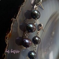 Beautiful pearl drop earrings in sterling silver. This vintage pair of earrings features natural cultured pearls in gorgeous dark, deap purple shade. They would make a gorgeous addition to every vintage jewelry collection. The earrings remain in great vintage condition. Hallmarked. Drop length: c 3.5 cm For your own impression, look at the pictures carefully to see all the details and check out size comparison prior to making a purchase. Do ask questions, especially regarding the dimensions if y Peacock Pearls, Size Comparison, Pearl Drop Earrings, Pearl Drop, Cultured Pearls, Sterling Silber, Jewelry Earrings Dangle, Vintage Jewelry, Jewelry Collection