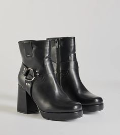 A pair of moto faux leather booties featuring a sleek square toe, a platform sole to elevate the style, a block heel, and a trendy side hoop strap design. Perfect for styling with a jacket.Fit & Features3.5" Block heel, 5” leg opening, 2.5” shaft heightFaux leather materialSquare toeInner side zipper closureSide hoop strap designPlatform soleRuns true to size Winter Moto Boots With Chunky Platform And Block Heel, Faux Leather Ankle Moto Boots With Chunky Platform, Faux Leather Moto Boots With Chunky Platform, Edgy Chunky Platform Boots With Square Toe, Trendy Platform Moto Boots In Faux Leather, Trendy Spring Moto Boots With Chunky Platform, Edgy Platform Boots With Stacked Block Heel, Edgy Heeled Boots With Buckle In Faux Leather, Edgy Chunky Platform Heeled Boots With Block Heel