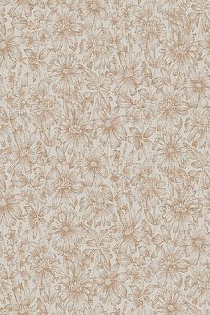 a beige and brown floral wallpaper with lots of small flowers on the top half of it