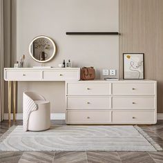 a white dresser and mirror in a room