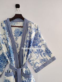 This kimono is made very neatly, and the matching strap has also been used in almost many places in the kimono, which makes the kimono very much. giving a beautiful look It looks good in the photo, but it looks great after wearing this kimono 100% Soft Cotton Hand Block Print Fabric Robe. The perfect to cover up your dance costume, to use for a dinner party or just slip into in on a beautiful summer morning. This particular beauty has a Japanese feeling to it. Cotton kimono robes are perfect for lounging around the home or spa. Use our Floral Hand block print robe :) Measurements: Size: Short & Free Size/ Plus Size Bust Approx: 120 CM ( 47 inch ) You can choose any length in this listing Length: 80 CM, 100 CM, 120 CM, 140 CM You can choose any color in the this listing * BLUE TIGER  * DARK Plus Size Lounge Wear Outfit, Fancy Robes, Night Wear Dress, Bridesmaid Kimono, Kimono Robes, Printed Robe, Floral Robes, Cotton Kimono, Short Kimono