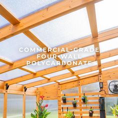 an image of a greenhouse with text reading commercial - grade four wall polycarbonate