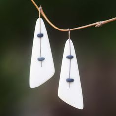 Inspired by the beautiful white sand beaches in Fiji's Yasawa islands these earrings convey tropical sensations. Warren and Robbin combine hand-carved bone with sterling silver adding minimalist details in smooth black rubber. Because each pair is individually handcrafted from natural materials slight variations are to be expected. .925 Sterling silver Production Jewelry, White Sand Beaches, Cow Bones, Brass Hoop Earrings, Beach Earrings, Brass Hoops, Elegant Pendant, Bone Carving, Earring Crafts