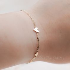 Dainty graduating small heart disc stacking bracelet made in 14K solid gold * Metal: 14K Yellow Gold * Coin size: approx. 3-6mm * Length: adjustable, total of 6.75" approx. * Stamp: 14K * Guaranteed Authentic Solid Gold, Not Plated or Filled ❤️Visit our official website for exclusive new products. https://elekalonjewelry.com/ ❤️Follow us on Instagram @ elekalonjewelry for the latest projects and much more! ❤️If you have any questions, please feel free to message us. Adjustable Wedding Chain Bracelet With Heart Charm, Adjustable Heart Charm Chain Bracelet For Wedding, Dainty Adjustable Bracelet With Heart Pendant, Dainty Adjustable Heart Pendant Bracelet, Dainty Heart Bead Bracelet Jewelry, Dainty Heart Beaded Jewelry Bracelet, Delicate Adjustable Heart Bracelet For Anniversary, Dainty Heart Beads Bracelet, Stackable Heart Bracelet For Valentine's Day