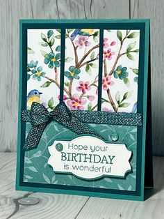 a handmade birthday card with flowers and a ribbon on the front, which reads hope your birthday is wonderful