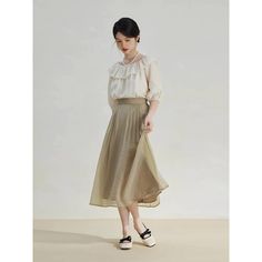 Discover Timeless Elegance Step into style with our Elegant High-Waist A-Line Mid-Calf Skirt, designed for the modern office lady who values sophistication and comfort. Crafted with a blend of high-quality nylon and polyester, this skirt epitomizes effortless elegance and durable wear. Its solid color and clean lines ensure it pairs seamlessly with both formal and casual tops, making it a versatile addition to your wardrobe. Features That Stand Out Empire Waistline: Enhances your silhouette, creating a flattering figure. Quality Fabric: Made with 51.1% Nylon and 48.9% Polyester, offering durability and comfort. Non-Stretch Broadcloth: Keeps its shape while offering a structured, polished look. Mid-Calf Length: Perfect for both office settings and social gatherings. Size chart Size Side Len Spring High-waisted Office Lady Skirt, Spring High Waist Office Lady Skirt, High Waist Office Skirt For Spring, Spring Office Lady Skirt, Office Lady Spring Skirt, Casual Office Skirt With Relaxed Fit, Feminine High-waist Skirt For Work, Feminine Pleated Skirt For Work, Feminine High Waist Skirt For Work