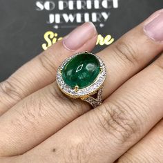 "ENJOY OUR WORRY-FREE SERVICE AND THE DAZZLING, GENUINE JEWELRY WE DESIGN AND HANDCRAFT WITH LOVE❤️ ABOUT THE ITEM: This ring is the perfect combination of elegance, beauty, and INVESTMENT VALUE! With a TRANSPARENT, 6.50 carats, VIVID FOREST GREEN emerald, and 52 extremely sparkling diamonds. The 18K yellow gold ring was deliberately designed and handcrafted by our boutique's in-house goldsmiths. You will love this gorgeous piece as much we do. And people will absolute adore it once they see the Luxury Diamond Cabochons For Wedding, White Gold Fine Jewelry Cabochons For Anniversary, Yellow Gold Diamond Cabochons Fine Jewelry, Fine Jewelry White Gold Cabochons For Anniversary, Luxury Gold Emerald Round Ring, Luxury Gold Emerald Ring, Classic Gold Diamond Ring With Cabochon, Luxury Yellow Gold Emerald Ring With Oval Cabochon, Classic Gold Cabochon Diamond Ring