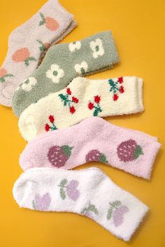 These soft fluffy socks are designed to provide maximum comfort, with a soft and fluffy material that feels gentle against your skin. Made from soft coral fleece material, these socks offer luxurious comfort with a playful twist. Adorned with charming fruit and flower designs. The socks are also designed to be lightweight and flexible, which allows you to move your feet freely without feeling constrained. You can wear with PJ or lounge wear. One Size Fits Allyarn: coral fleecematerial: polyester Aesthetic Fuzzy Socks, Cozy Soft Socks For Spring, Cute Socks Aesthetic, Cute Fuzzy Socks, Pr Boxes, Pretty Socks, Socks Aesthetic, Sweet 17, Random Products