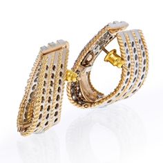 Important 18K Yellow Gold 6 Carat Diamond Twist Huggie Earrings. Post for pierced ears. Center Diamond Weight: 6.00Metal Type: 18K Yellow GoldMetal Weight: 29.2 gr.Condition: Excellent.Stock: RR7107 Luxury Clip-on Huggie Earrings For Formal Occasions, Luxury Gold Hoop Earrings With Prong Setting, Luxury Gold Diamond Earrings For Anniversary, Luxury Gold Huggie Earrings With Prong Setting, Luxury Cluster Earrings For Formal Occasions, Luxury Hallmarked White Gold Huggie Earrings, Luxury Hallmarked Diamond Earrings For Anniversary, Luxury Gold Diamond Cut Huggie Earrings, Designer White Gold Diamond Earrings For Anniversary