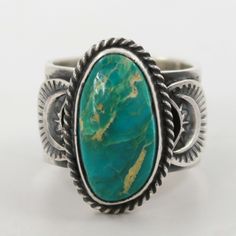 Sterling Silver Ring with Intricate Hand Stamped Designs and set with Natural Royston Turquoise from Nevada by Navajo Silversmith, Sunshine Reeves. Ring Size: 7.75.5” Setting Width, .875” Setting Height.5” Band Width Concho Belt, Zuni Jewelry, Navajo Jewelry, Royston Turquoise, Southwestern Jewelry, Pendant Rings, Stamp Design, Turquoise Ring, Antique Jewelry