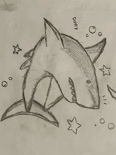 a drawing of a shark with stars on it