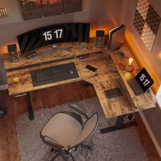 a computer desk with two monitors and a keyboard on top of it in an office