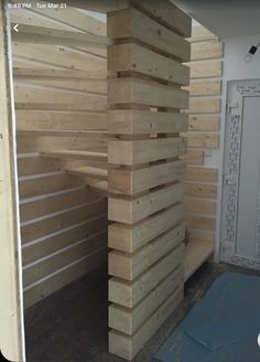 a room that has some wood stacked on top of each other