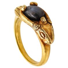 Victorian 1860 Ancient Revival Ram Ring in Solid 22Kt Yellow Gold With Sapphire | From a unique collection of vintage Cocktail Rings at https://www.1stdibs.com/jewelry/rings/cocktail-rings/. Stylized Head, Ancient Rings, Long Horns, Grey Sapphire, Vintage Cocktail Ring, Egyptian Revival, Onyx Jewelry, Special Ring, Wax Casting