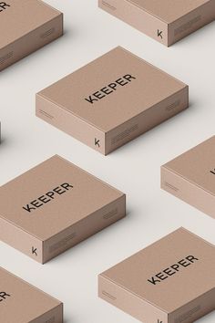 several cardboard boxes with the word keeper printed on them, all lined up in rows