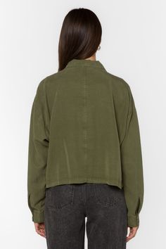 Experience ultimate comfort and style with our Charlynn Fern Green Jacket. With long sleeves and a loose, oversized fit, this utility style jacket is perfect for any occasion. The drop shoulder design adds a trendy touch, making it a must-have in your wardrobe. Stay effortlessly chic and cozy in this statement piece. Material: 100% Tencel™ Eco-Friendly Machine Wash Color: Fern Green Model is 5'10" and wearing a size S Imported Utility Cropped Jacket With Pockets For Fall, Fall Button-up Tops With Side Pockets, Oversized Utility Jacket With Multiple Pockets For Fall, Oversized Long Sleeve Blazer With Pockets, Long Sleeve Shacket With Multiple Pockets For Work, Workwear Shacket With Multiple Pockets And Long Sleeve, Fall Utility Blazer With Patch Pockets, Solid Button-up Outerwear With Patch Pockets, Utility Blazer With Patch Pockets For Fall