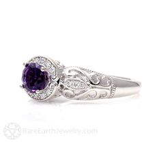 An absolutely gorgeous vintage inspired Amethyst ring ring in your choice of 14K or 18K White, Yellow or Rose Gold. This ring has a .75ct natural Amethyst surrounded by a sparkling diamond halo and diamonds in the leaves of the gorgeous filigree band. It's a beautiful right hand ring or engagement ring. Inquire for the matching wedding band. Amethyst is the birthstone for February. Made to order. Please allow three to four weeks for delivery. ABOUT THIS RING Composition: 14K or 18K Gold Center S Heirloom 14k Gold Amethyst Ring With Accent Stones, Heirloom Purple Sapphire Ring For Anniversary, Classic Amethyst Birthstone Ring With Accent Stones, Heirloom Amethyst Ring With Center Stone, Heirloom Amethyst Ring With Accent Stones, Exquisite Amethyst Ring For Anniversary, Heirloom Purple Ring With Center Stone, Heirloom Purple Rings With Accent Stones, Elegant Purple Sapphire Ring With Center Stone