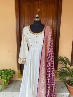 Hand embroidered Anarkali with banarasi bandhej dupatta / anarkali suit set / anarkali dupatta USA / khaddi georgette dupatta / Indian dresses/ voggish / cream anarkali dress          Looking for a perfect indian dress/anarkali/suit sets that are trendy, unique and easy to carry !! yess, You are at the right place. we carry such versatile pieces of anarkalis and suit sets that really let you stand out in any occassion !!      featuring this beautiful pure chanderi dress in cream color with hand White Anarkali Suits With Red Dupatta, White Anarkali Dress, Cream Anarkali, White Anarkali Suits, Indian Dresses Anarkali, Handloom Dupatta, Chanderi Dress, Bandhej Dupatta, Anarkali Tops