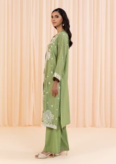 2 Piece - Embroidered Suit Make a bold statement with this 2-piece green dress, crafted from a combination of silk cotton net and viscose raw silk, with intricate embroidery for added texture and style. The full-sleeved jacket features a crew neckline, plain back, and embroidered border, while the trousers feature a boot cut design. Perfect for any occasion, this dress will be sure to turn heads. 2-Piece Front Open Jacket with TrousersMake a fashionable statement in green front open jacket featu Festive Green Kurta With Floral Embroidery, Green Cotton Silk Kurta With Chikankari Embroidery, Anarkali Cotton Silk Kurta For Spring, Spring Anarkali Cotton Silk Kurta, Embroidered Cotton Silk Kurta For Summer, Spring Cotton Silk Kurta With Zari Work, Summer Embroidered Cotton Silk Kurta, Spring Cotton Silk Sets With Zari Work, Pista Green Long Sleeve Silk Kurta