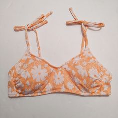 Light Orange With White Flowers Bikini Swimsuit Top. Textured, Material. Ties At The Top. Bra Style Fit. Removable Padding. Pair With Your Favorite Bikini Bottom New Without Tags Size Large Top Bra, Cute Bathing Suits, Bra Style, Swim Suits, Bra Styles, Light Orange, Swimsuit Tops, Orange White, Womens Swim