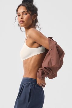 You’ll swear by this bralette—it’s made from our newest fabric, so it’s buttery-soft, lightly supportive, and seriously stretchy. It has a simple silhouette, a scoop neck, and skinny, adjustable straps. As for the second-skin fit, it prevents digging or pinching and ensures a smooth look while layering. Alo Yoga Fitted Seamless Sports Bra, Alo Yoga Activewear With Built-in Bra For Yoga, Compressive Bra-friendly Alo Yoga Activewear, Alo Yoga Top With Built-in Bra For Yoga, Sporty Alo Yoga Activewear With Built-in Bra, Ballet Pink, Alo Yoga, Grey Shoes, Red Hot