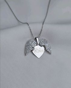 * All of the Product is Silver. * chain length 45cm * Name, date, texts you want are written * You can specify the product details in the product detail section of the order stage. * It is sent with its original box and bag. *925 sterling silver. Customized Silver Necklaces With Heart Pendant, Customized Silver Necklace With Heart Pendant, Customized Silver Heart Pendant Necklace, Silver Heart Pendant Name Necklace As Gift For Her, Silver Double Heart Sterling Silver Name Necklace, Silver Sterling Double Heart Name Necklace, Silver Customized Nameplate Heart Necklace, Customized Silver Nameplate Heart Necklace, Silver Custom Name Heart Necklace